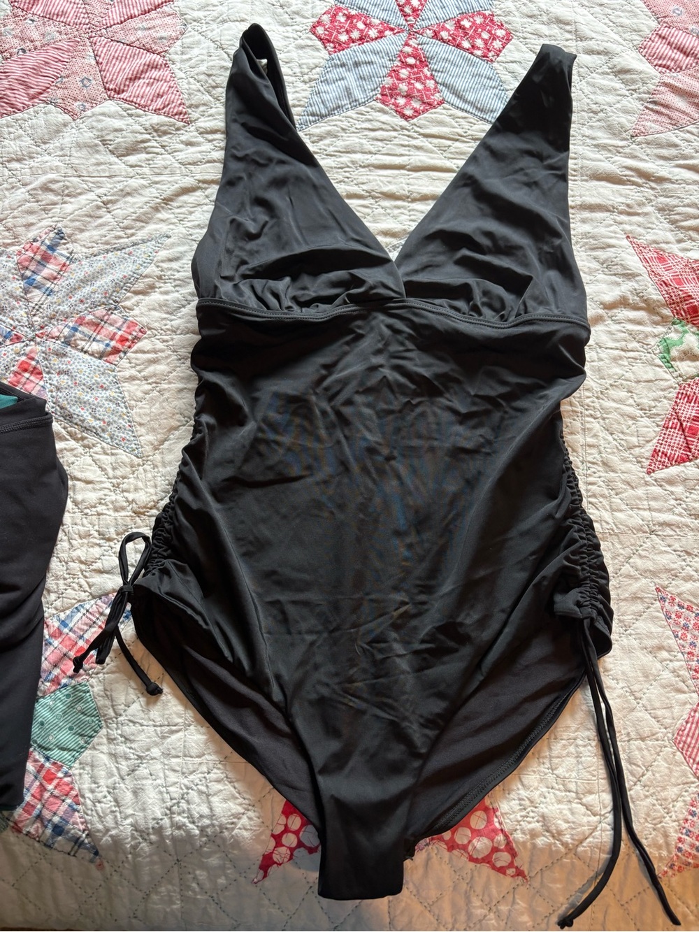 Black One-Piece Swimsuit with ruching and Side Ties